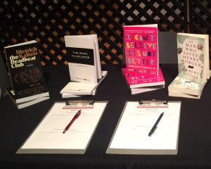 The four Book Club books on a table